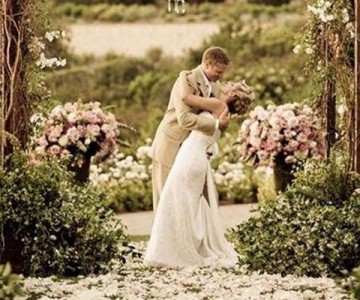 Large Urns  of assorted matching flowers 