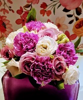 A SPLASH OF LAVENDER A Petit Hand-Tied bouquet. No vase.