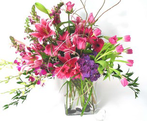 Lavish Her Day Designer's Choice Luxury Collection We ask that you allow our designer's to create a beautiful bouquet with the flowers we have available.