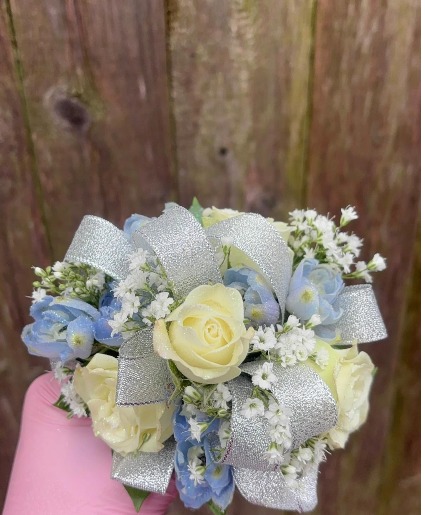 Light blue Delph & mini Roses Corsage