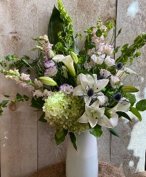 Lily is in the air Arrangement in a vase 