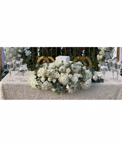 Long head table white centerpiece  