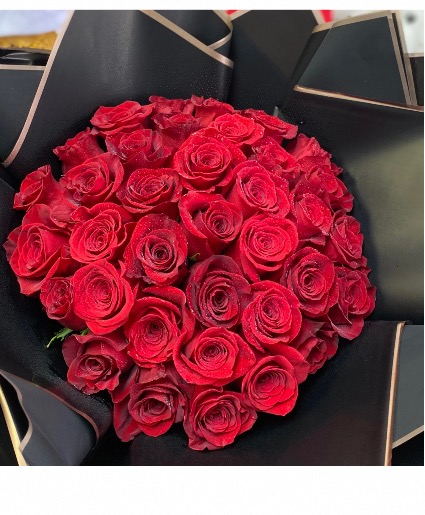 25 & 50 Long Stem Wrapped Roses  