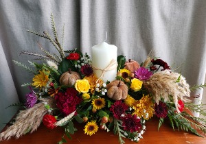 LOVE AND LAUGHTER CENTERPIECE FLOWER ARRANGEMENT