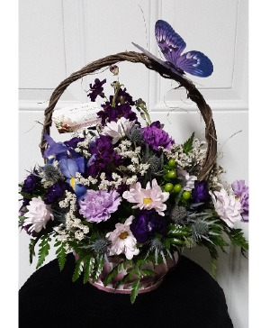 Love of purple centerpiece basket arrangement
