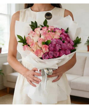 luxurious Purple & Pink Roses  wrapped Bouquet 