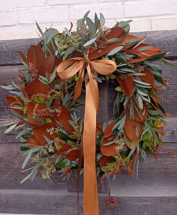 Magnolia Wreath with mixed greens  in Glastonbury, CT | THE FLOWER DISTRICT