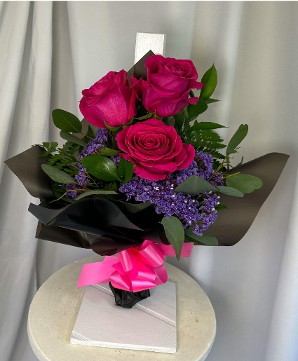 Mini Fuchsia Flame 3 Fuchsia rose with purple filler wrapped or  vase