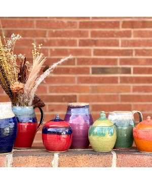 Mixed arrangement in local pottery 