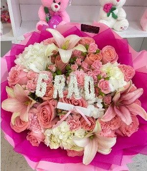 Mixed Bouquet  Bouquet made of roses, lilys, hydrangeas, carnations, and spray mini roses.