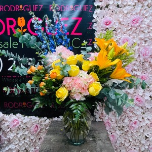 Moonlight Arrangement Arrangement made of roses, spray mini roses, delphinium, lilys, hydrangeas, etc.