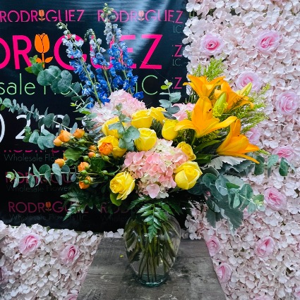 Moonlight Arrangement Arrangement made of roses, spray mini roses, delphinium, lilys, hydrangeas, etc.