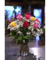 Multi Colored Dozen Roses  Vased With Baby's Breath