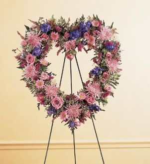 OPEN HEART STENDING SPRAY from Roma Florist Frieds family can send this directly to the funeral home