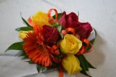 orange and yellow wrist corsage
