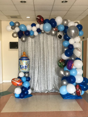 Organic swag any theme with short columns variable sizes of latex and Mylar balloons not backdrop