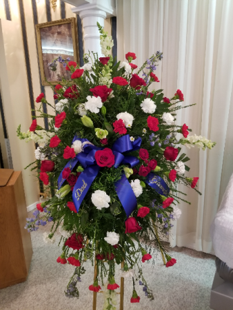 Patriotic Memory  standing easle spray  in Cassville, MO | CAREY'S CASSVILLE FLORIST