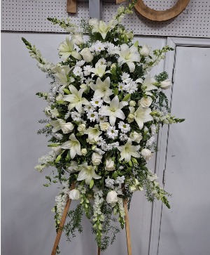 Peaceful lilies standing spray  Funeral 