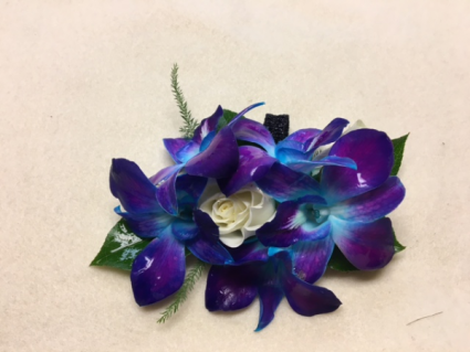 Peaking through the Orchids Wrist Corsage