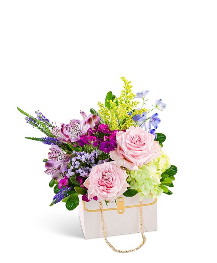 Petal Prelude Clutch Flower Arrangement