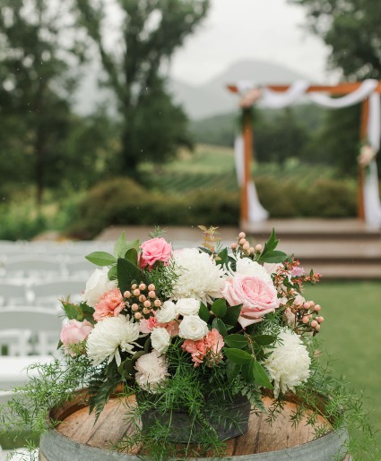 pink and whte wine barrel at Cenita ceremony