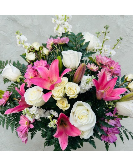 Pink and white fusion All pink flowers and white vase arrNgment