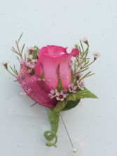 Pink rose with ribbon loop and wax flower  