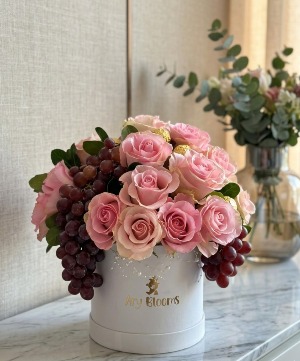 Pink roses, Grapes and Chocolates Arrangement