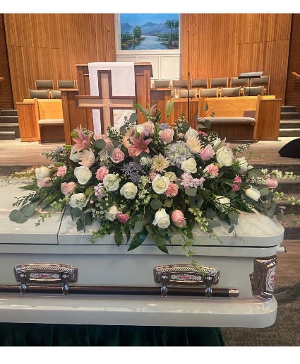 pink. white lavender mixed tribute casket flowers