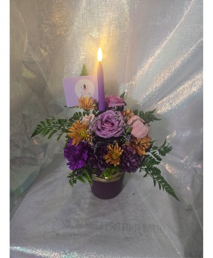 Plum harvest florals with candle Flower Arrangement