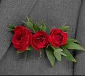 RED ROSE TRIO POCKET BOUTONNIERE 