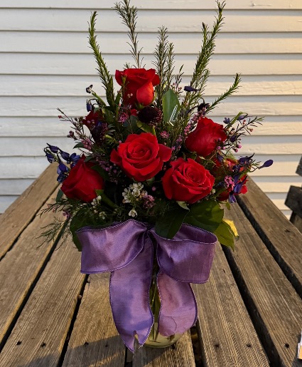 Pure romance 12 red roses with purple accent 