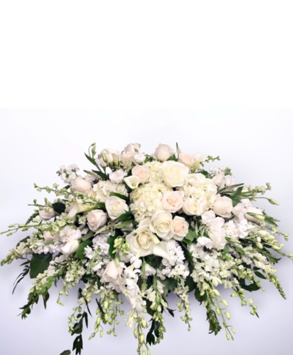 Pure white casket arrangement 