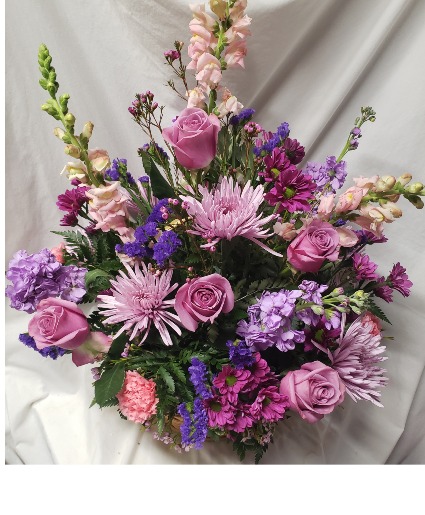 "Purple and Pink Delight" (S)...mixture of purple  and pink flowers arranged...flowers may vary depending on stock availability.  Need usually 1 day notice. 