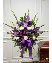 Purple and white funeral arrangement 