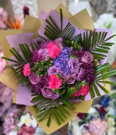 Purple flowers wrapped in purple  