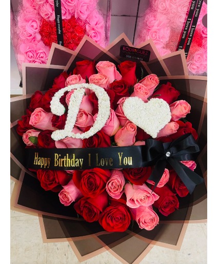 R32: Bouquet of 50 roses Bouquet made of 50 roses with a baby breath heart and letter of choice