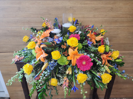Radiant Sunset Casket Spray