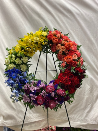 Rainbow Delight Fresh wreath  in Winter Park, FL | APPLEBLOSSOM FLORIST & GIFTS