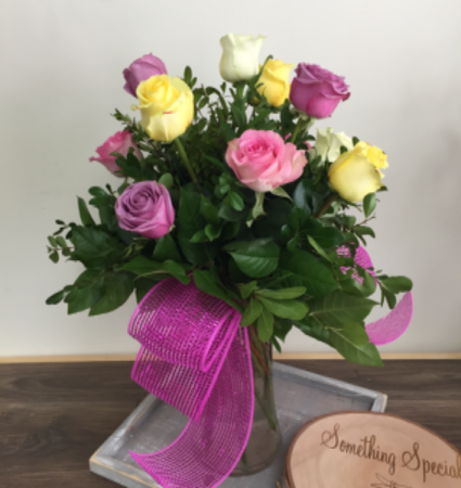 Rainbow of love 12 rose vase arrangement