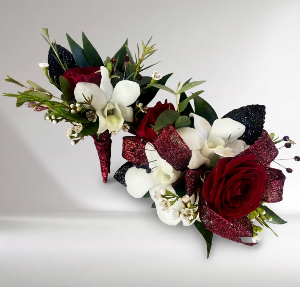 Red, white & black  corsage & boutonniere