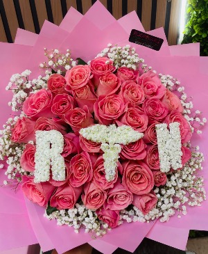 RN Bouquet Bouquet made of 36 roses with baby breath letters & logo