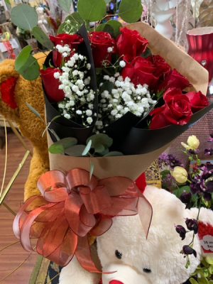 Romance wrapped bouquet Choose from 12 Wrapped roses/ 24 roses/or 36 roses 