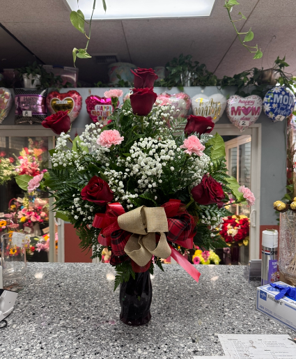Roses and Carnations in a vase  
