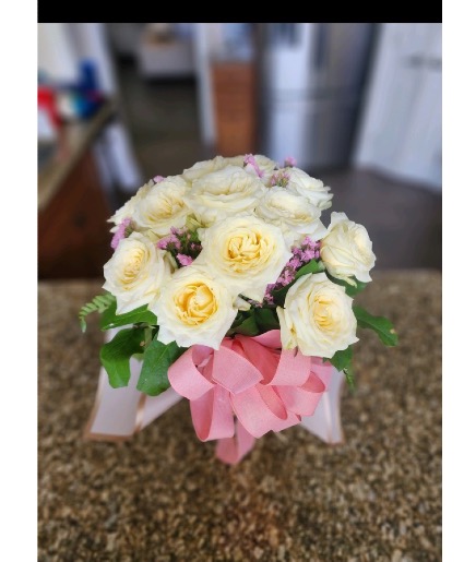 Roses in hand!  Wrapped bouquet. Any color available 
