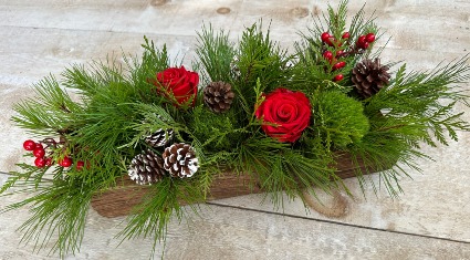 Rustic Log Holiday Centrepiece with winter greenery and  roses