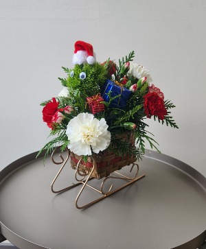 Santas Suprise  Fresh arrangement