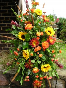 Seasonal fall standing spray Funeral flowers