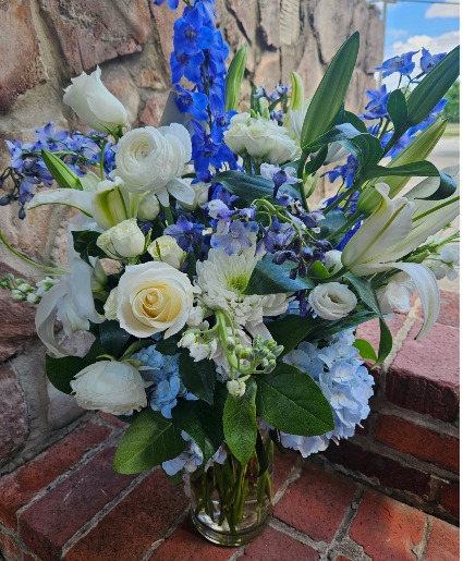 Send the pretty blues  Fresh flowers in glass vase