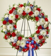 Serene Blessings Red, White & Blue Standing Wreath sympathy flowers